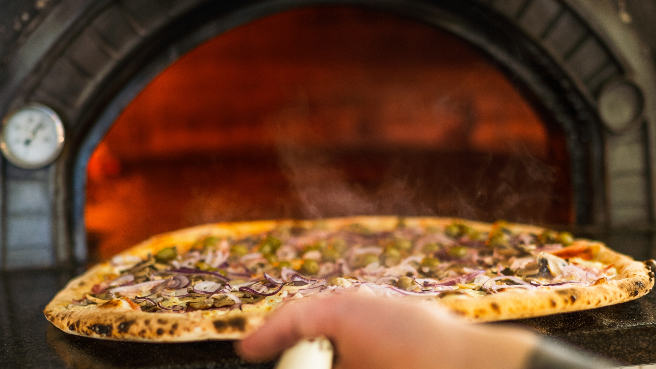 is it cheaper to build your own pizza oven